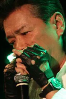 成田賢